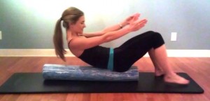 Challenge your balance and abdominals with a roll up while on the foam roller!